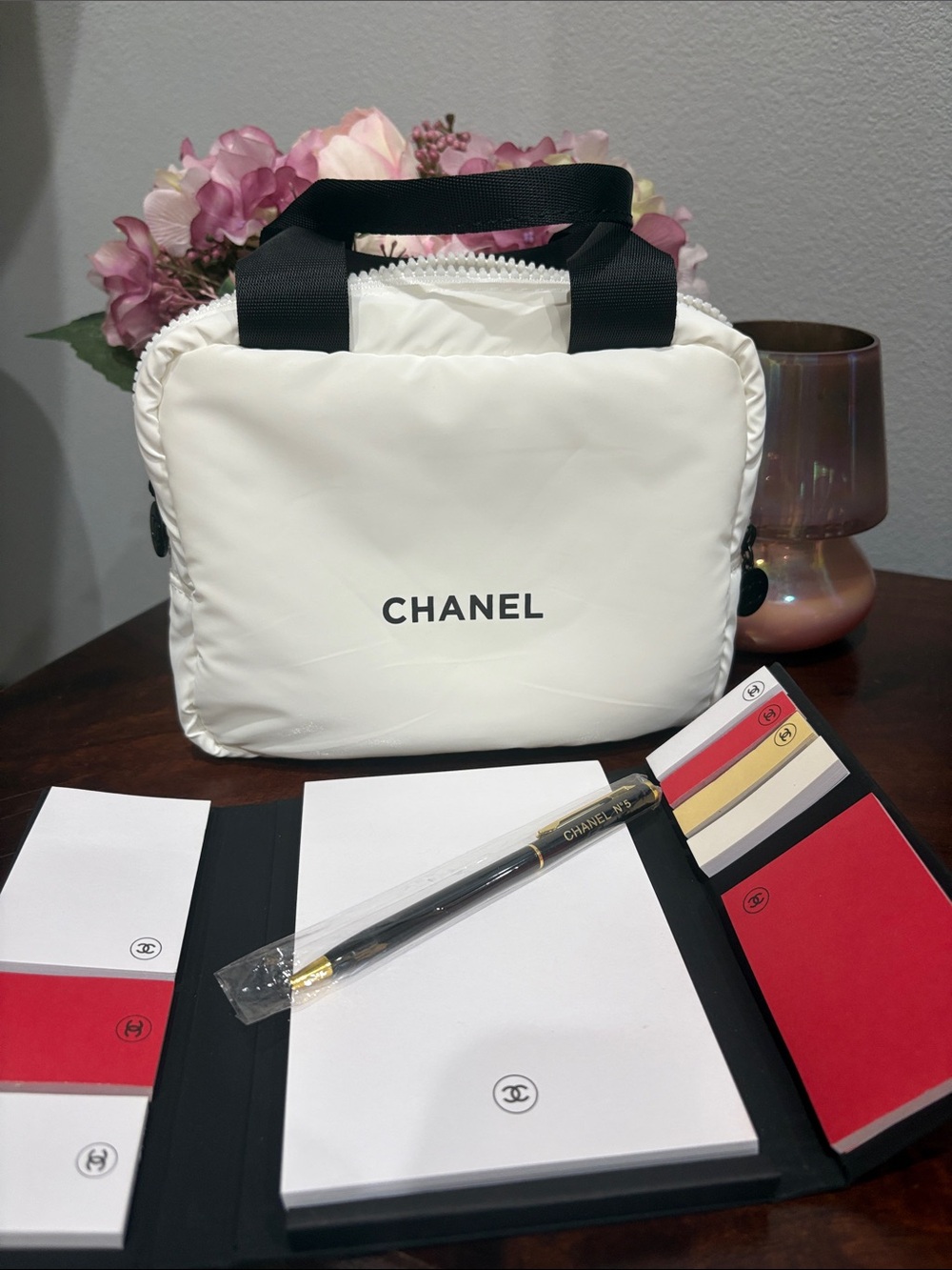CHANEL White Cosmetic Travel Pouch with Black Handles comes with sticky pad,pen
